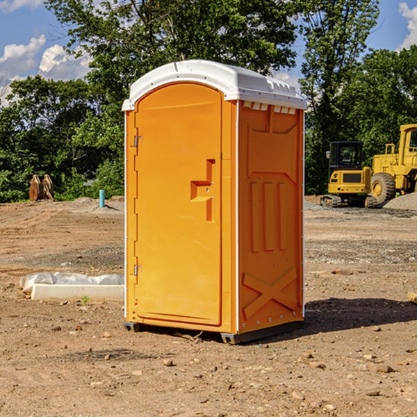 what is the cost difference between standard and deluxe portable restroom rentals in Bradford Woods